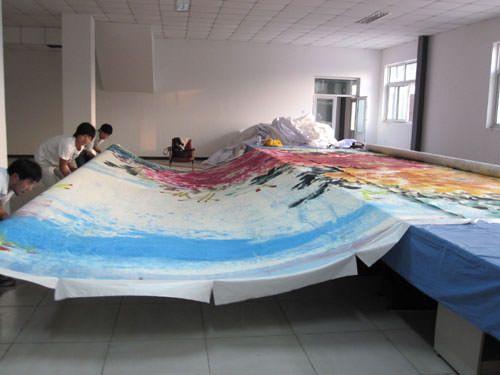 Rolling up the big Chinese painting