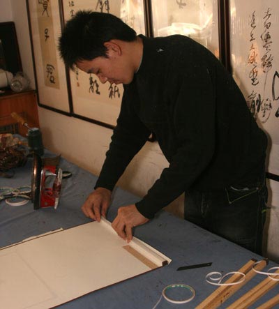 Finishing the installation of the wooden top frame