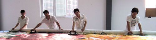 Lots of manpower to mount big Chinese painting Lots of manpower to mount big Chinese painting